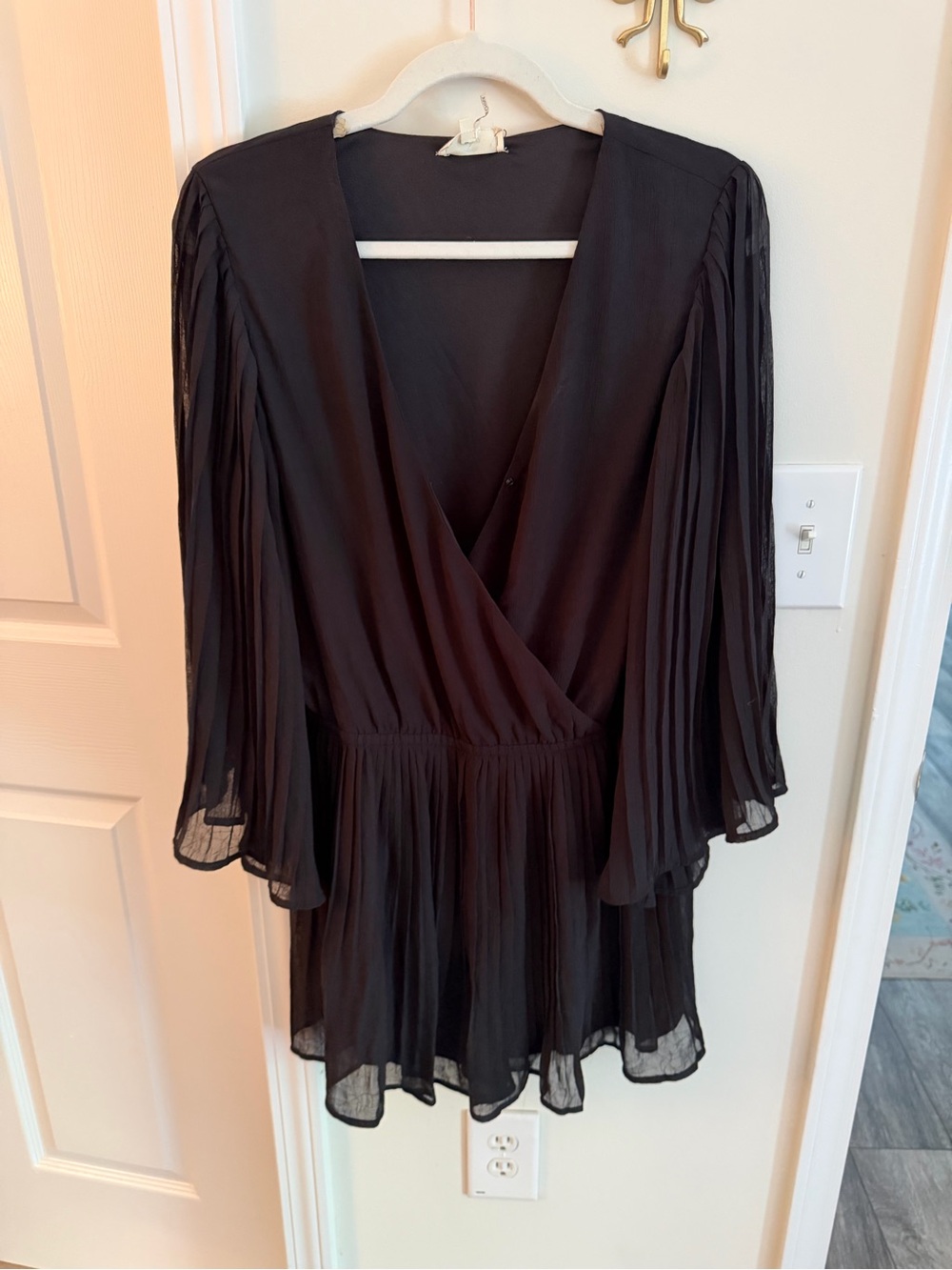 Black faux wrap front pleated romper